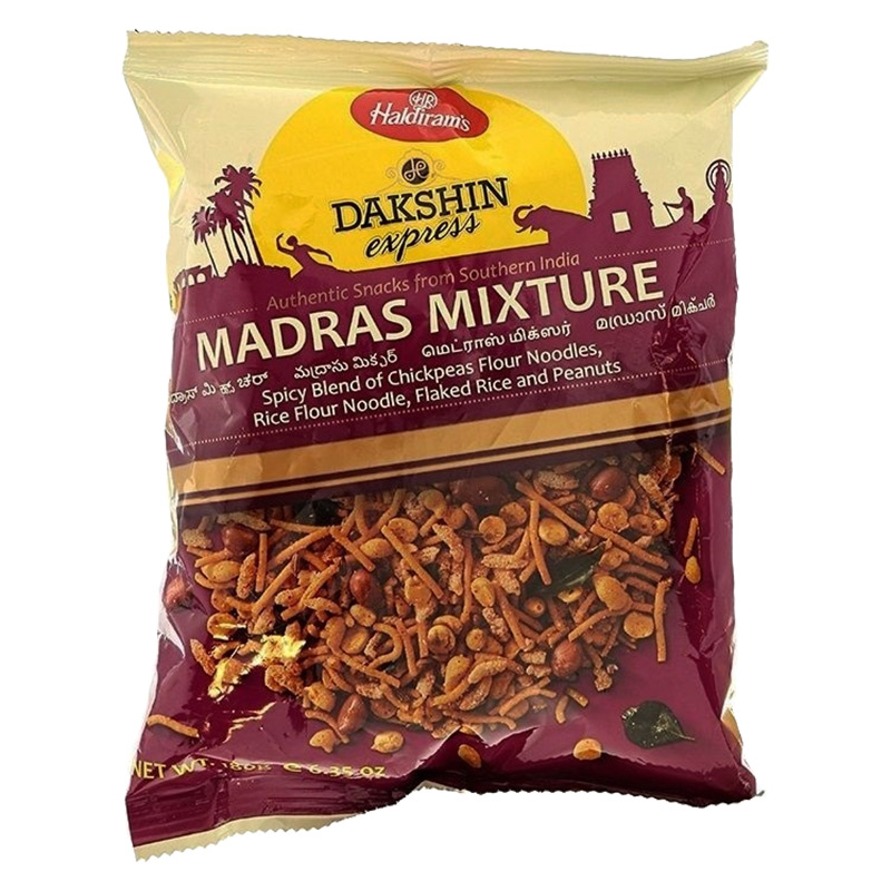 Haldiram's Madr Mixture en snacksblandning av kikärtsnudlar, risnudlar, risflingor och jordnötter. En av de populära och läckra sydindiska snacks som är populära till högtiden Diwali.