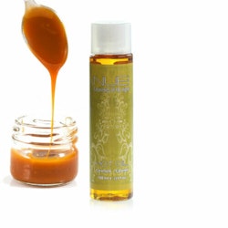 Nuei, ätbar, värmande massageolja - Caramel