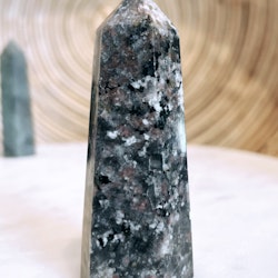 Yooperlite, glowing stone , torn