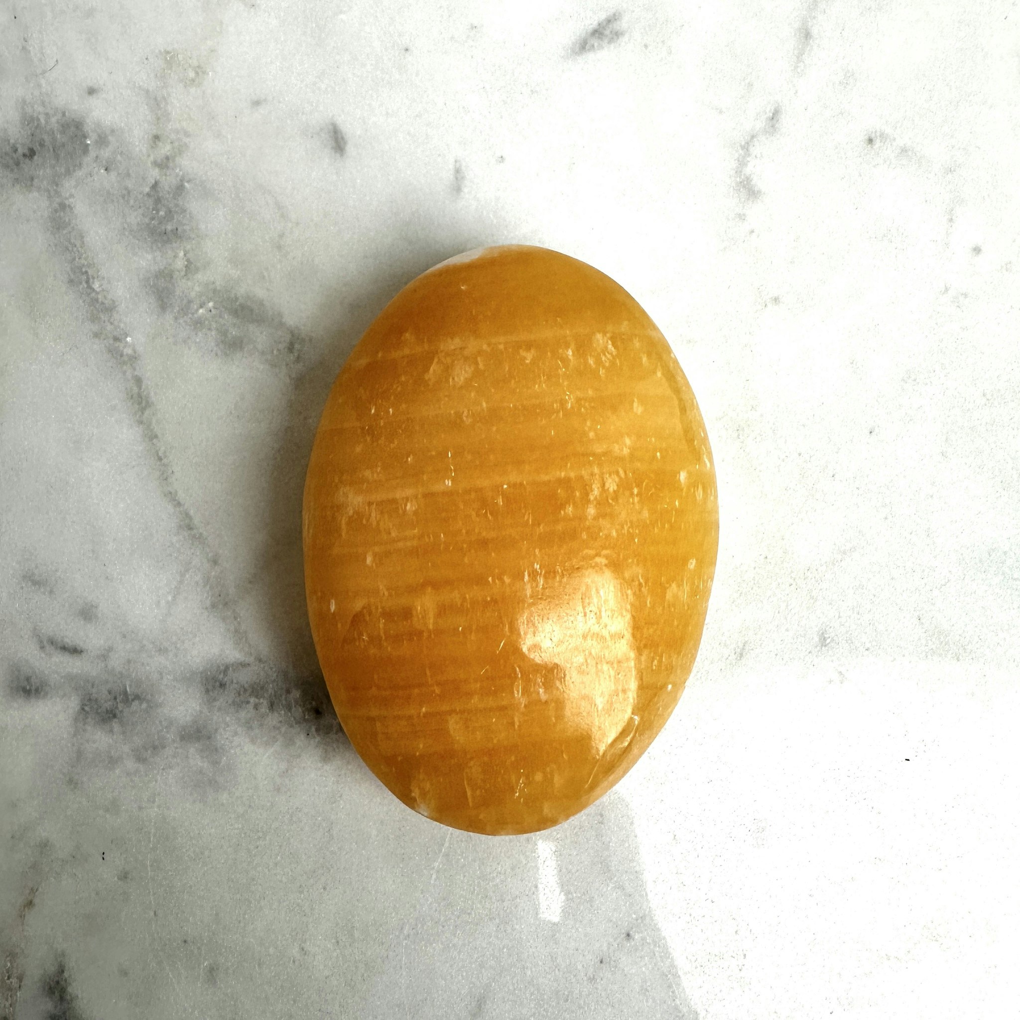 Orange Kalcit, palmstone (A)