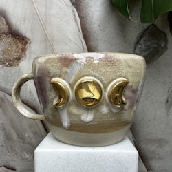 Temugg Golden Moons, Earth (B)