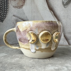Temugg Golden Moons, Earth (E)