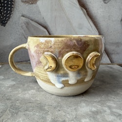 Temugg Golden Moons, Earth (I)