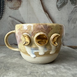 Temugg Golden Moons, Earth (I)