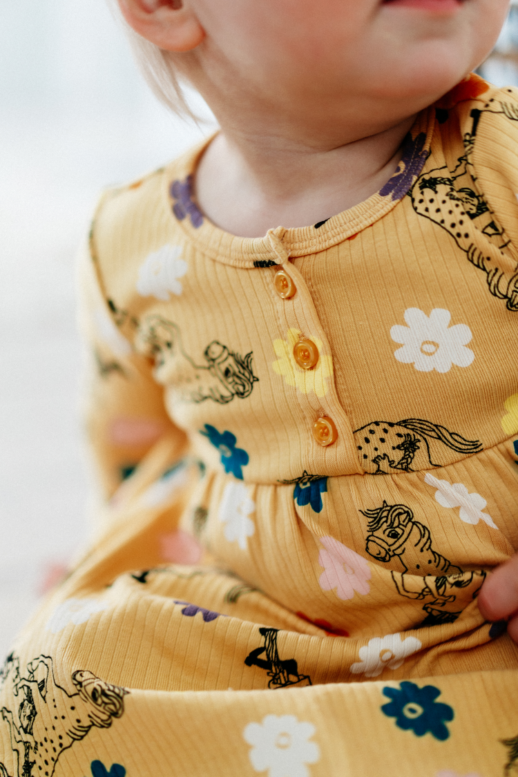 Blomma klänning baby beige