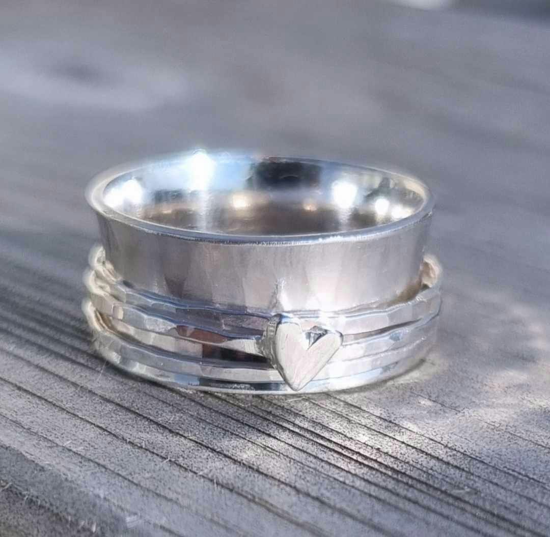 Snurring i äkta silver med handsågat hjärta