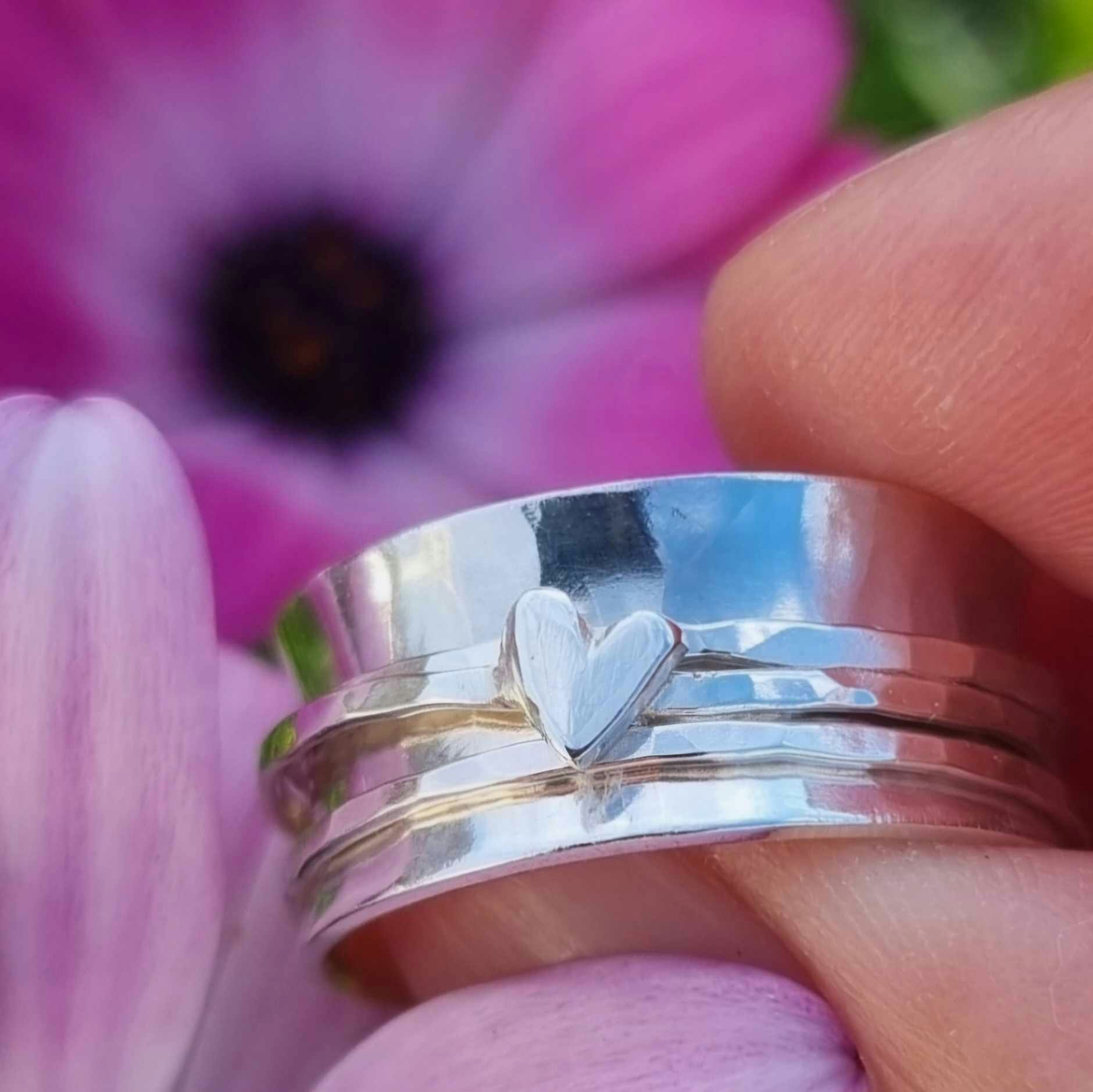 Snurring i äkta silver med handsågat hjärta