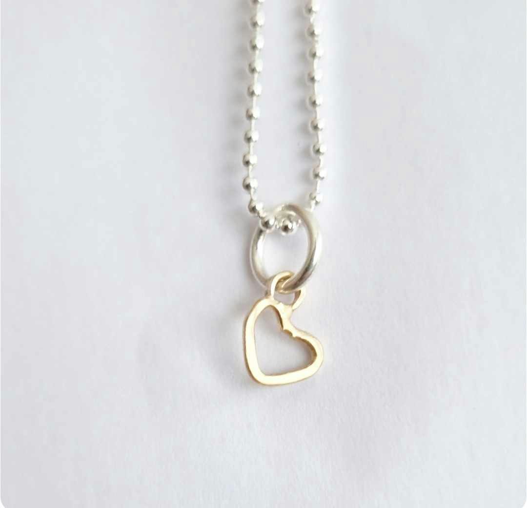 Sweetheart a small and beautiful hand-forged gold heart in genuine 18k gold