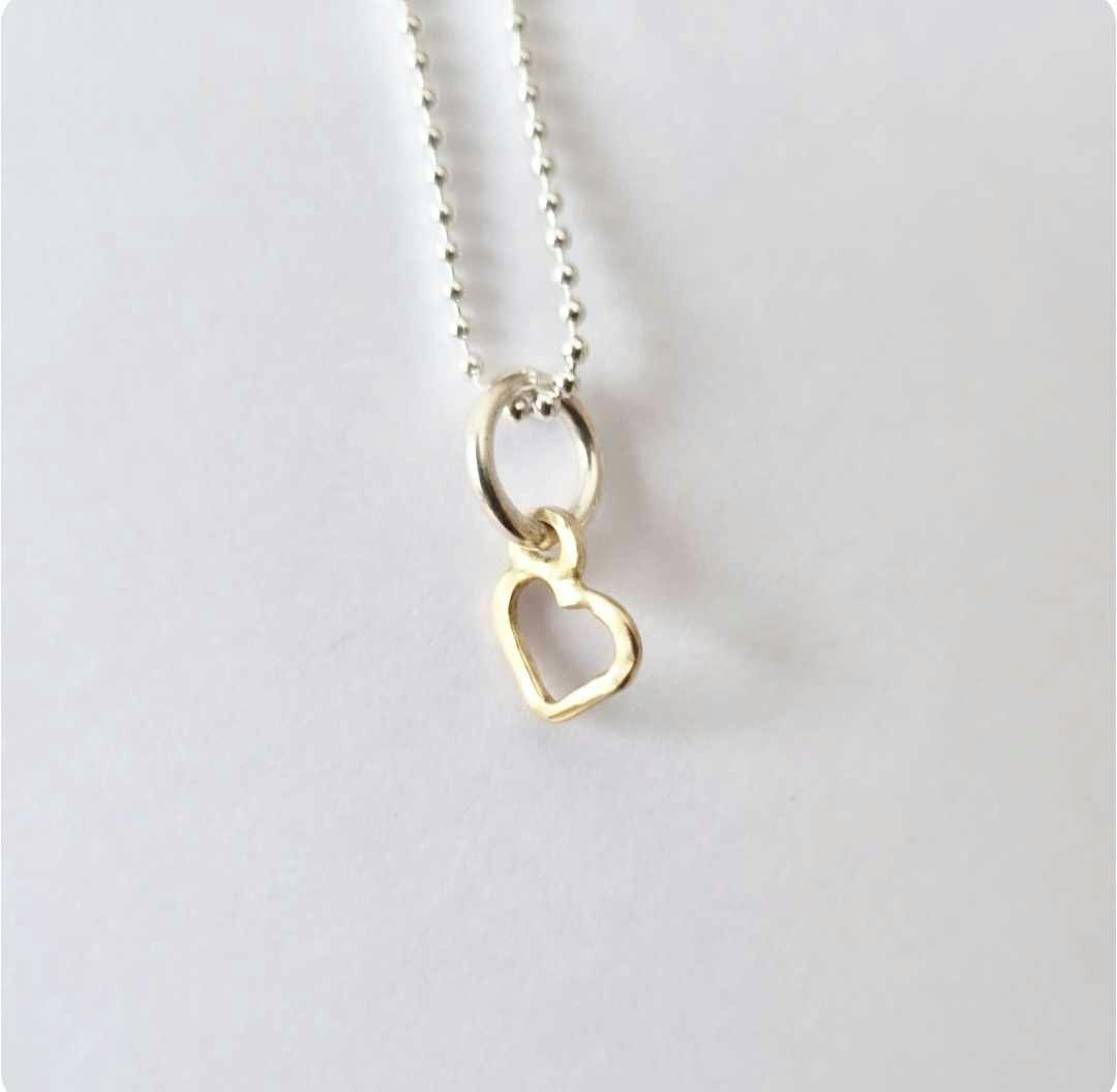Sweetheart a small and beautiful hand-forged gold heart in genuine 18k gold