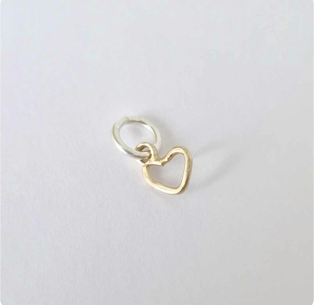 Sweetheart a small and beautiful hand-forged gold heart in genuine 18k gold