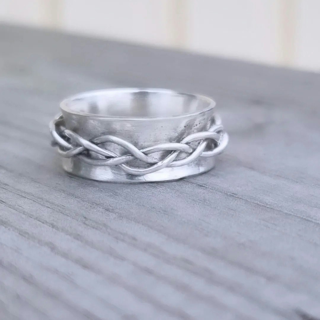 Harmoni - Spinning ring with silver braid handmade in genuine silver