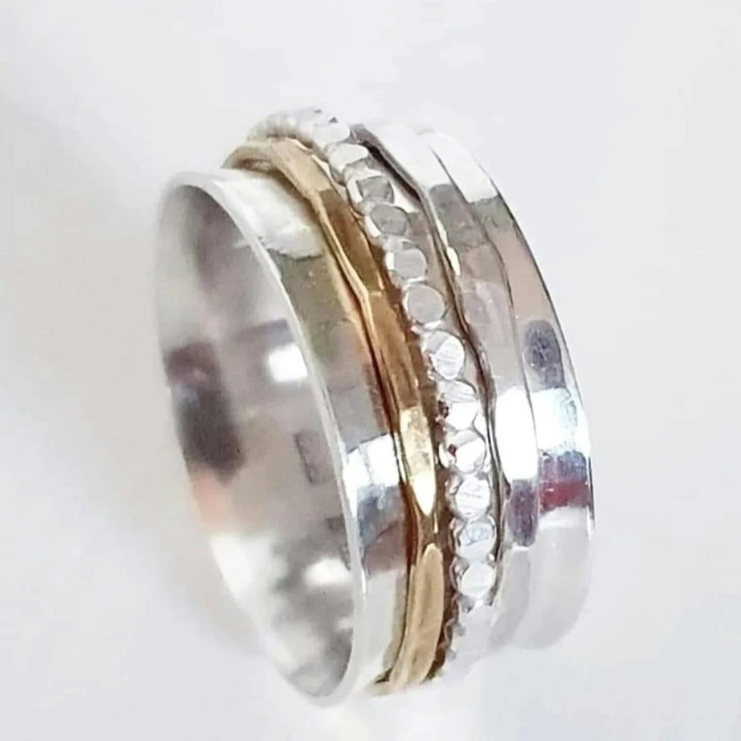 Snurring - spinningring i äkta silver med kulring, silver och mässingring