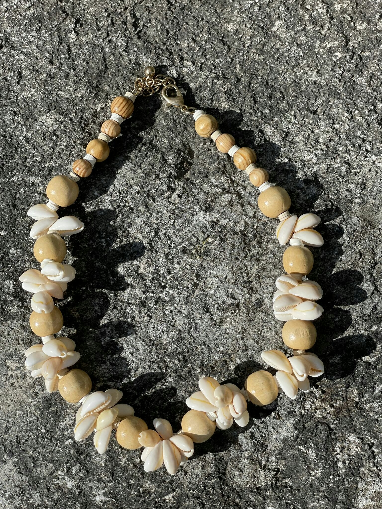 Necklace with wooden beads and shells
