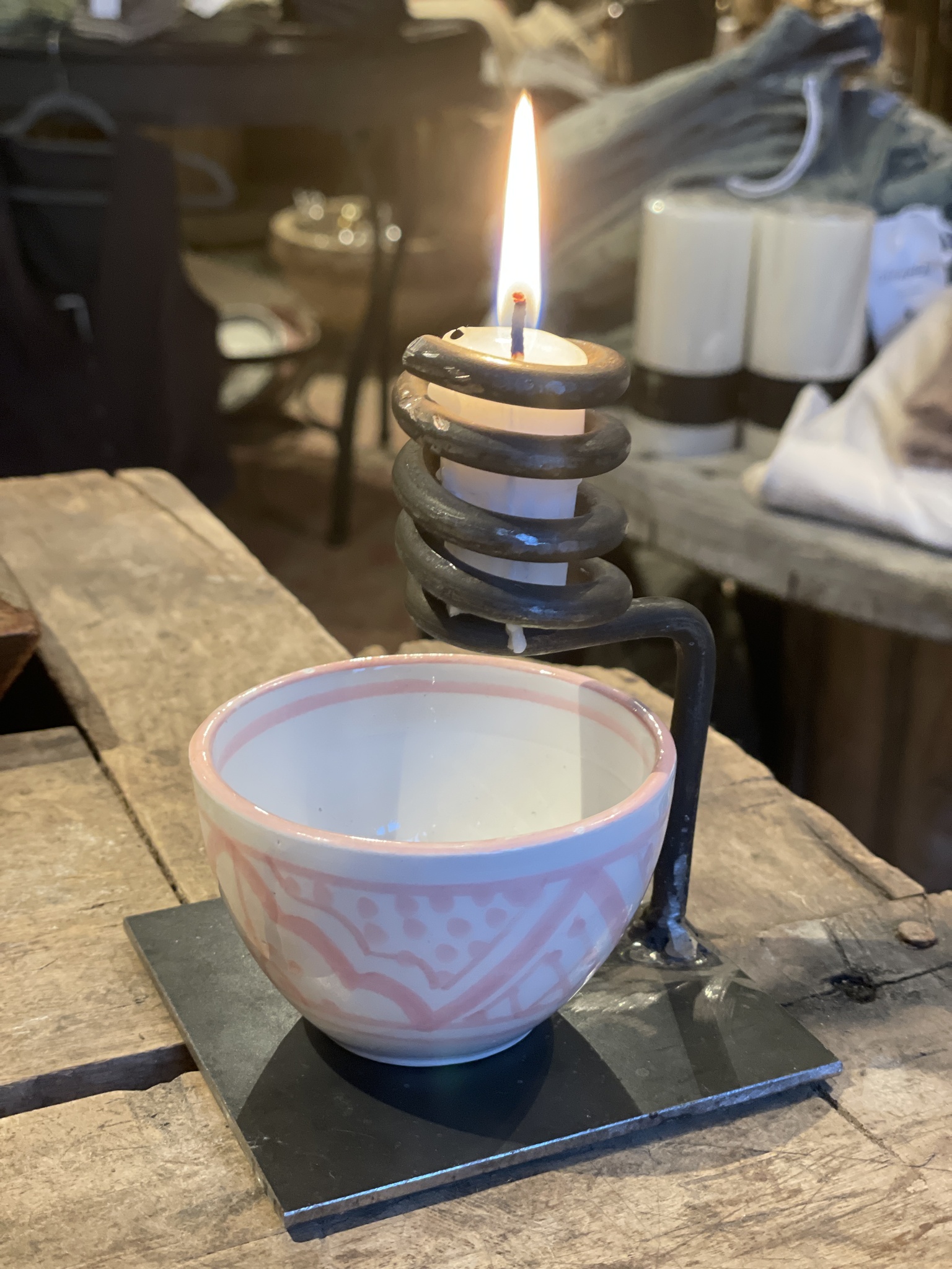 Ljustake/ stumpbrännare i gjutjärn och keramik