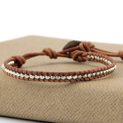 Leather bracelet with silver plated stones.