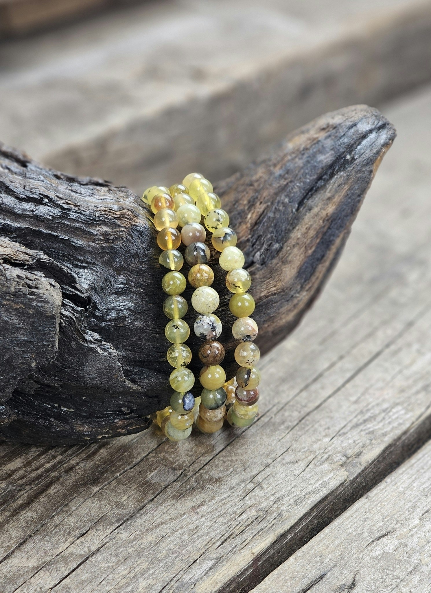 Gul Opal, armband 6mm runda pärlor