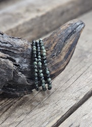 Kambabajaspis, armband 4mm facetterade pärlor
