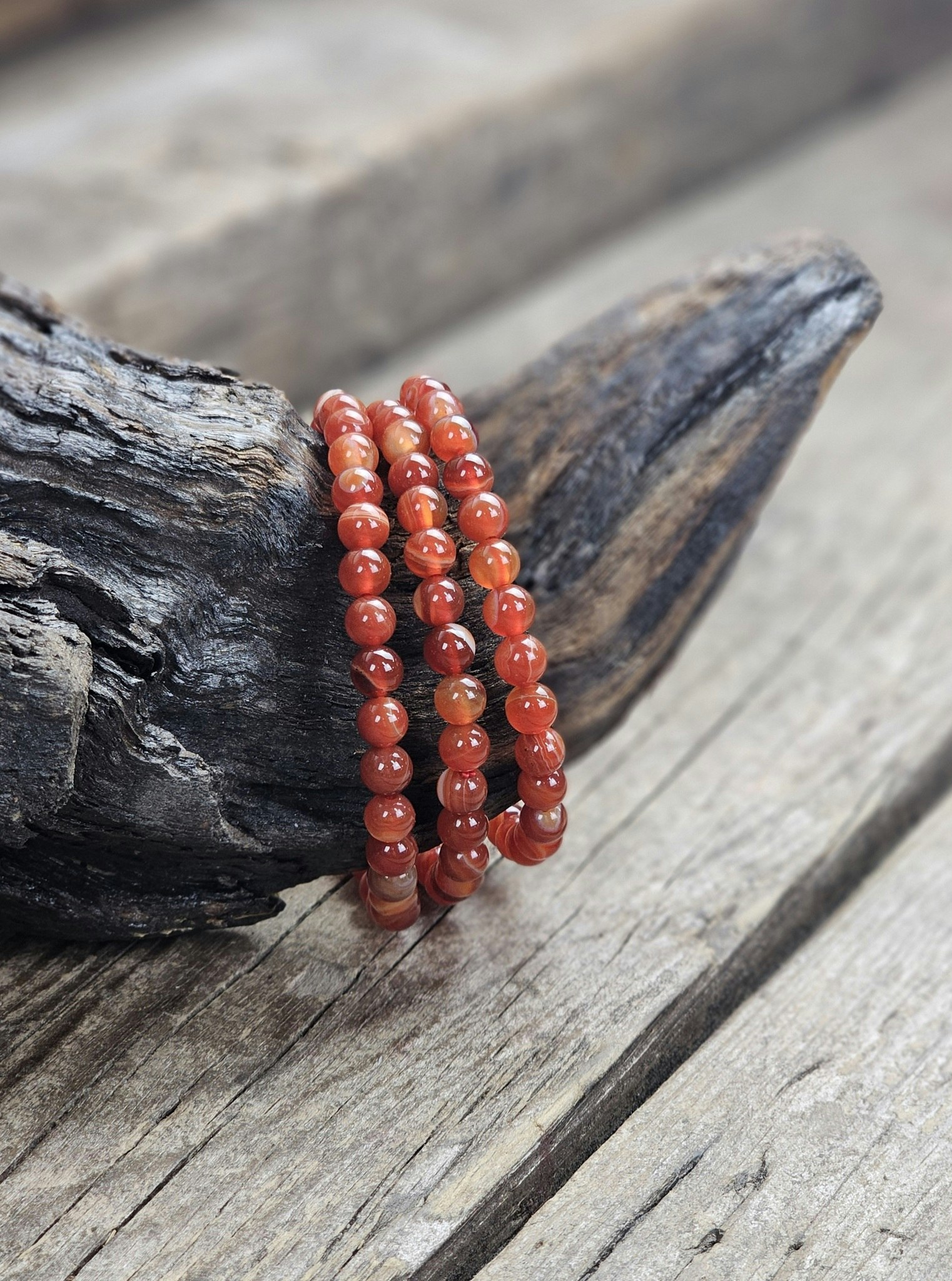 Karneol (röd/bandad), armband 6mm runda pärlor