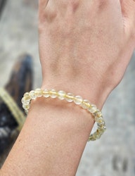 Guldrutilkvarts, armband 6mm runda pärlor