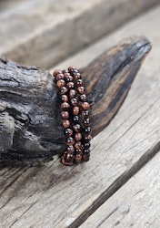 Oxöga, armband 6mm runda pärlor