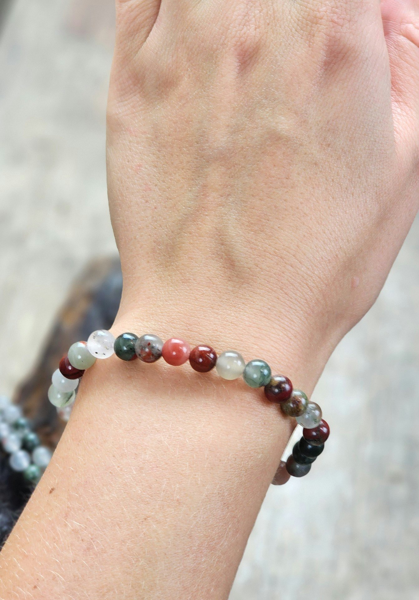 Vulkanjaspis, armband 6mm runda pärlor