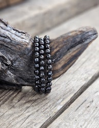Astrofyllit, armband 6mm runda pärlor