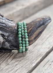 Buddstone, armband 6mm runda pärlor