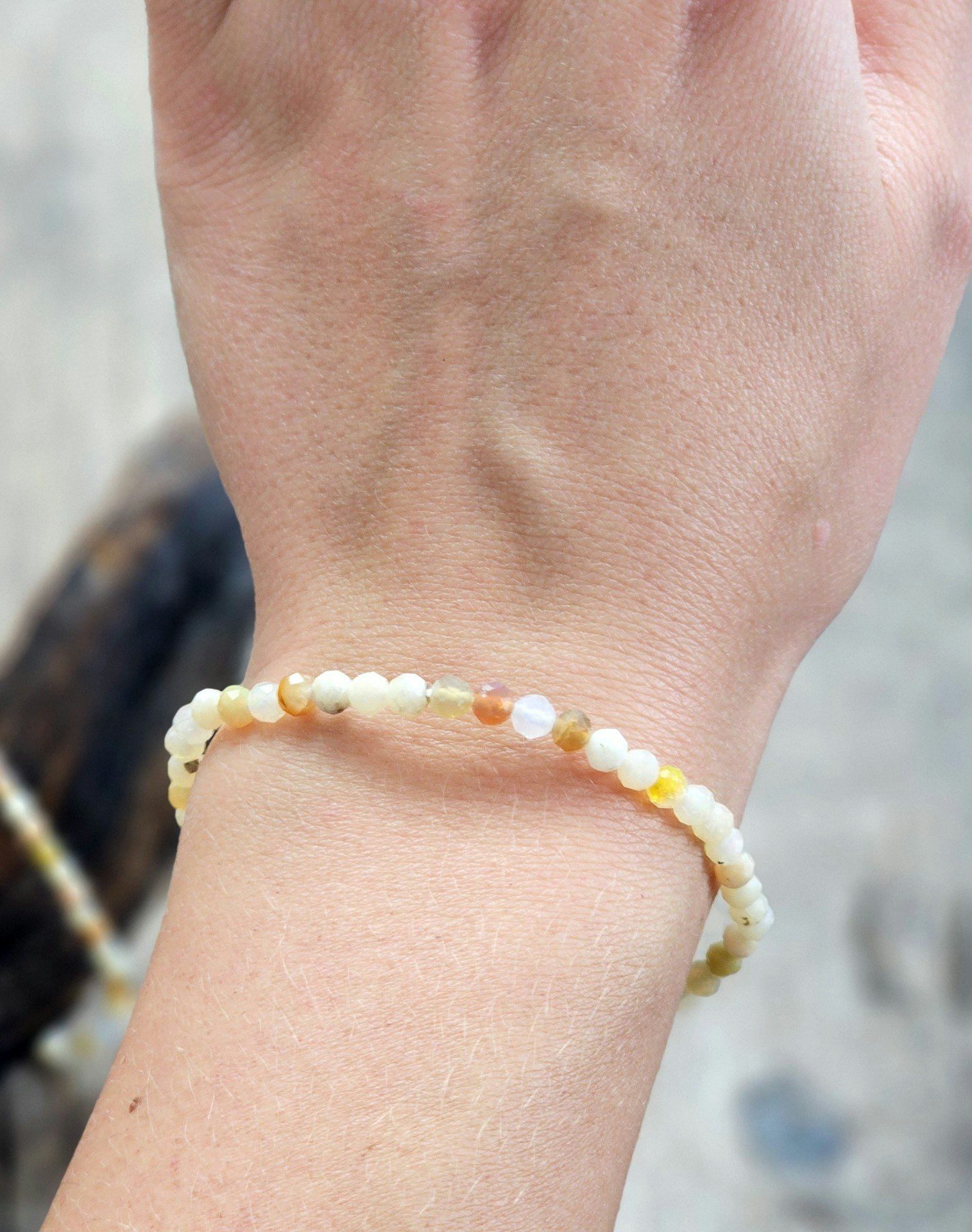 Fire Opal (Eldopal), armband 4mm facetterade pärlor