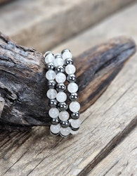 Bergkristall & Hematit mix, armband 8mm runda pärlor