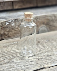 Glasflaska med kork, mellan
