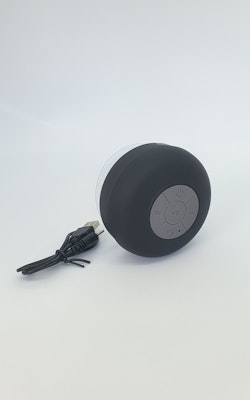 Vattentät bluetooth högtalare med sugpropp