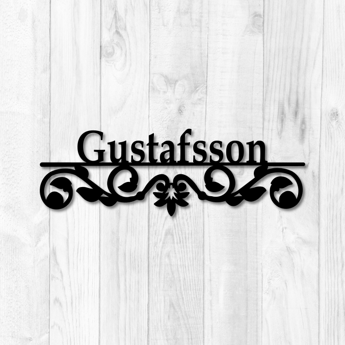 Eget namn i metalldekor med krusigt motiv, med namnet Gustafsson.