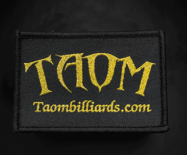 Taom Badge