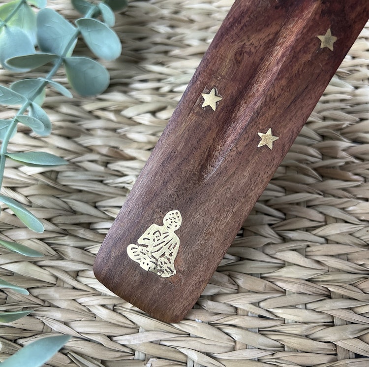 Rökelsehållare (skida) med emblem av mässing i form av Buddha
