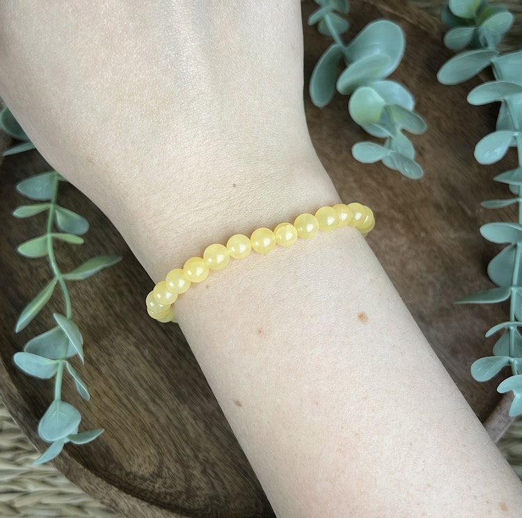 Stenarmband av gul kalcit (6 mm)