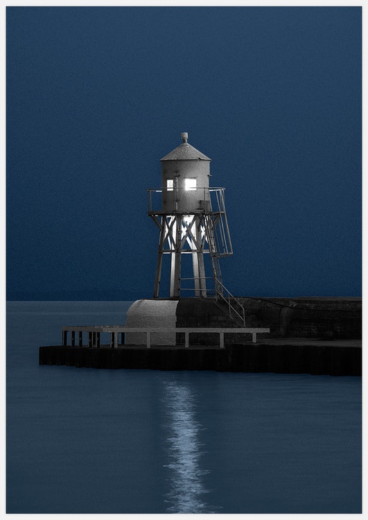 Lighthouse by night Art Print