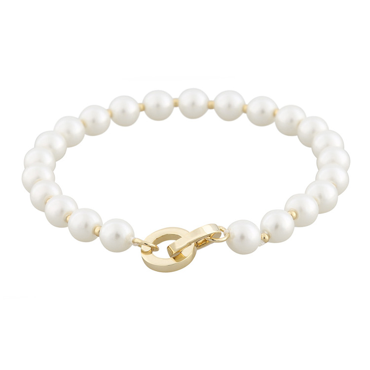 Eleganta armbandet five pearls i färgerna vit och guld från Snö of Sweden.