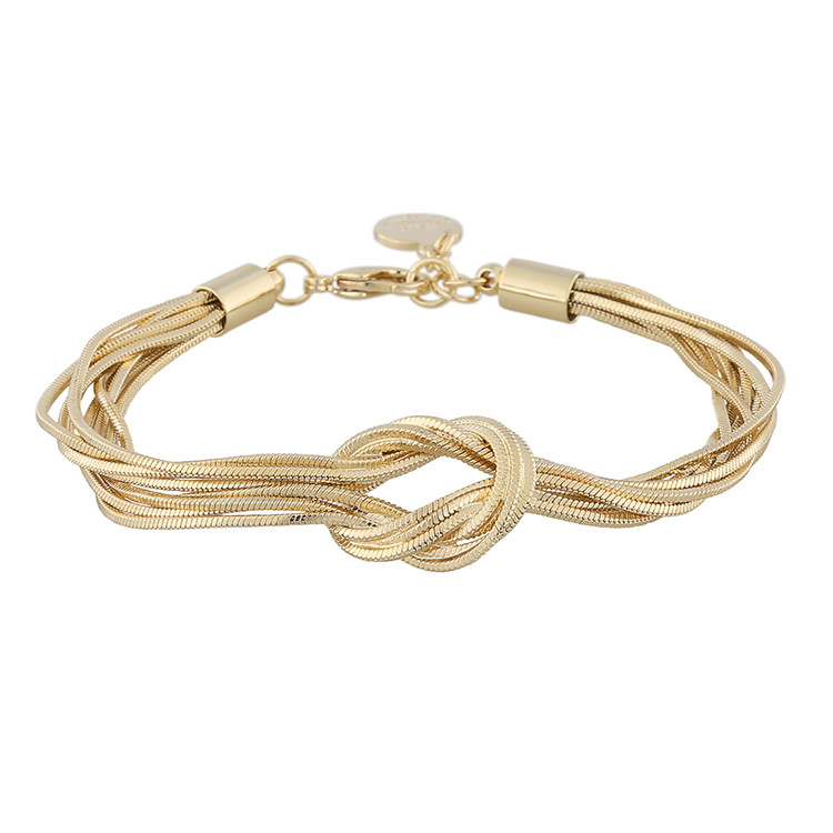 Presenttips Knot brace guld armband från Snö of Sweden.