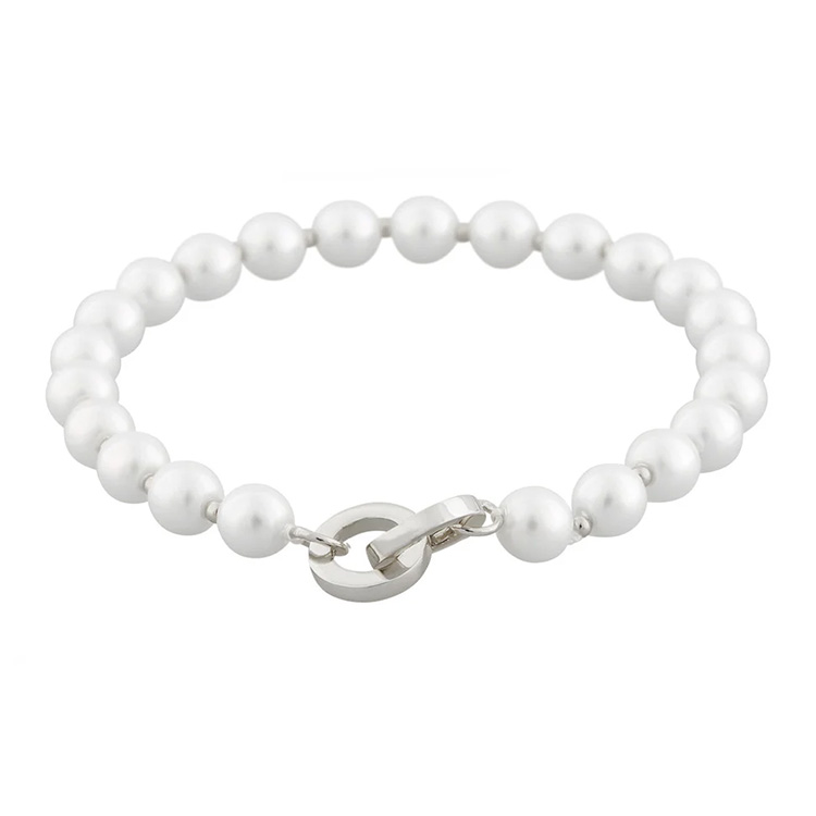 Eleganta armbandet five pearls i färgerna vit och silver från Snö of Sweden.