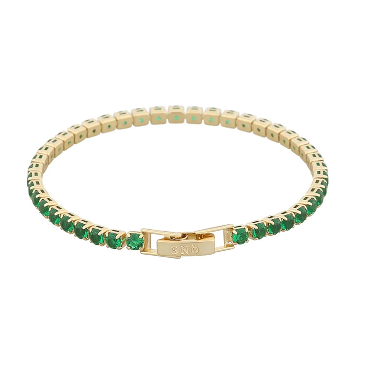 Populära armbandet London stone armband guld med vackra gröna stenar från Snö of Sweden.