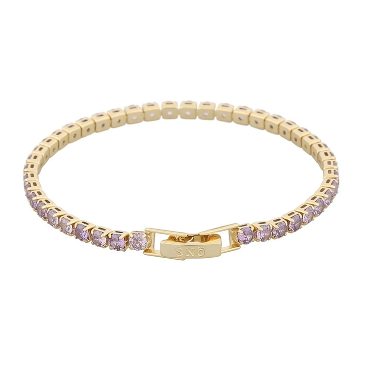 Populära armbandet London stone armband guld med vackra lila stenar från Snö of Sweden.