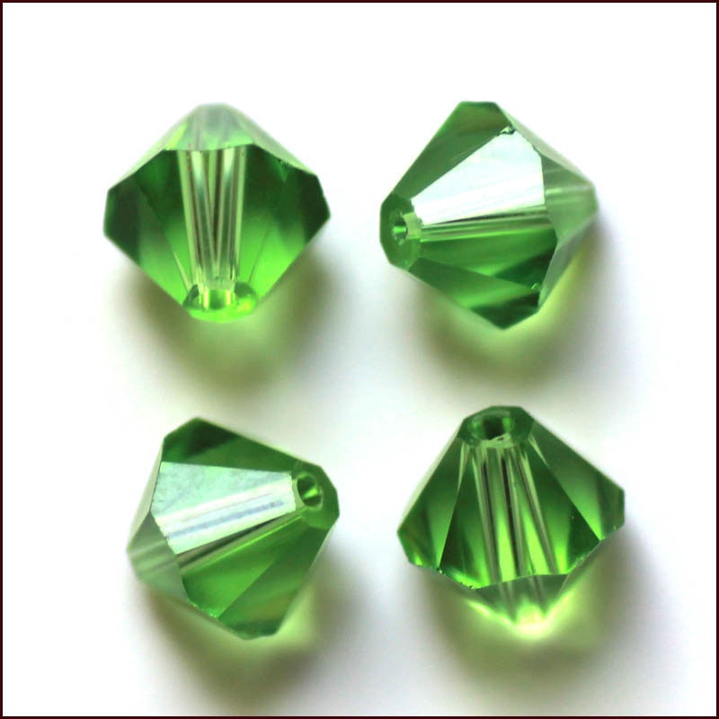 Lyxiga fasetterade Bicon glaspärlor - Klass AAA - klar grön - 10-p -6x6mm