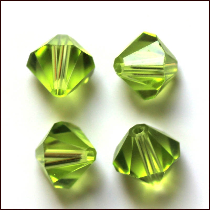 Lyxiga fasetterade Bicon glaspärlor - Klass AAA - gul grön - 10-p -6x6mm