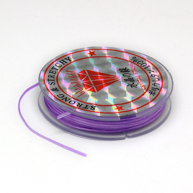 Färgad Elastisk nylontråd på rulle 0,6mm Mellanlila