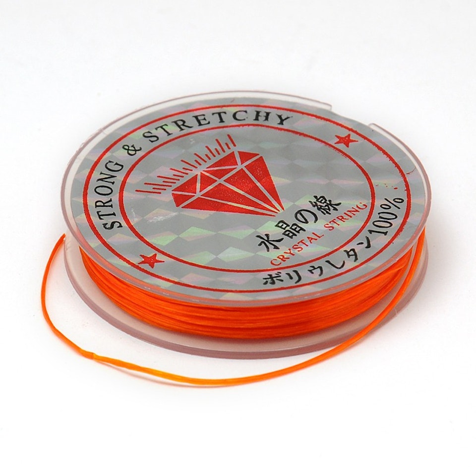 Färgad Elastisk nylontråd på rulle 0,6mm Mörk orange