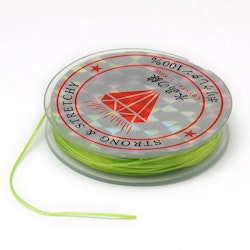 Färgad Elastisk nylontråd på rulle 0,6mm Ljus grön