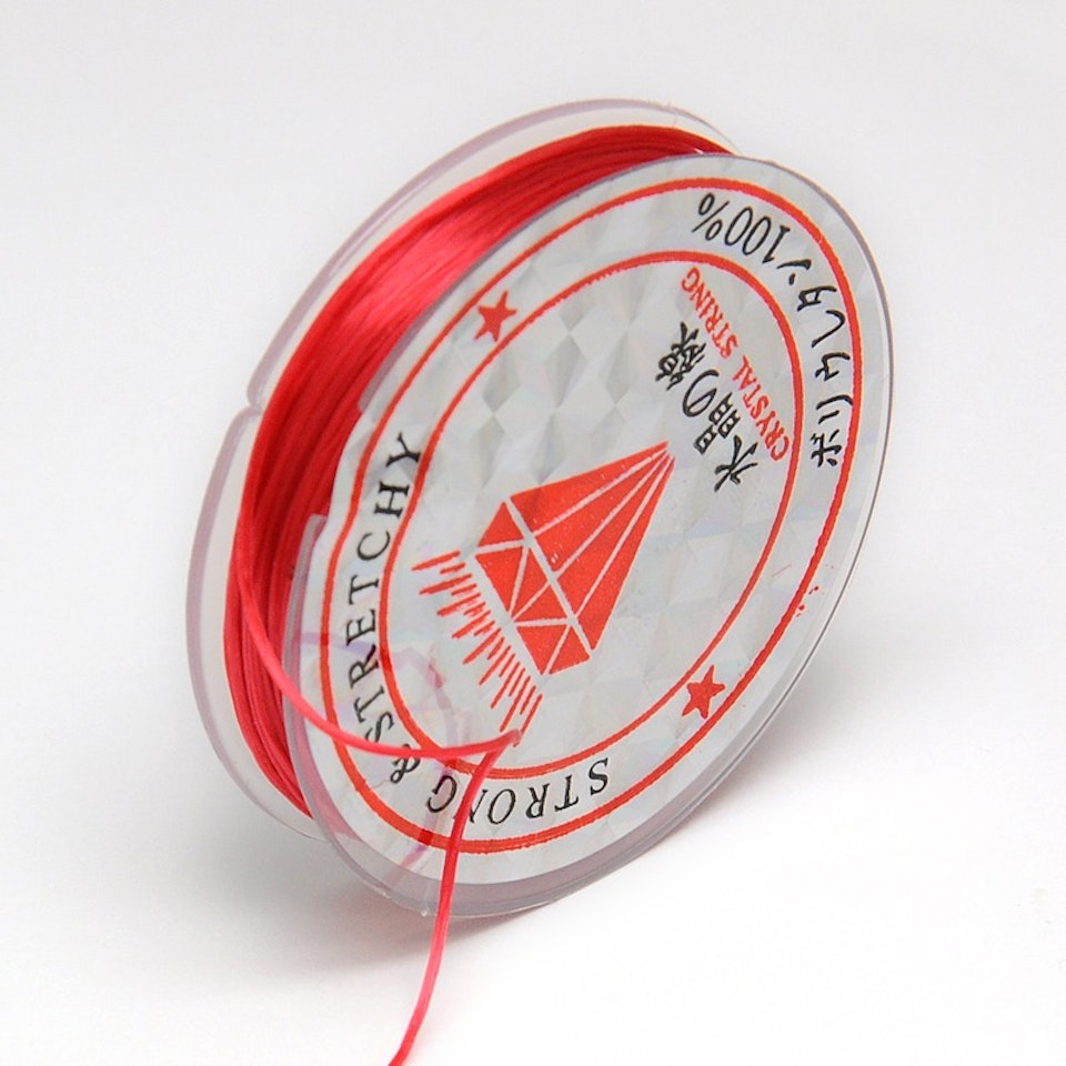Färgad Elastisk nylontråd på rulle 0,6mm Röd