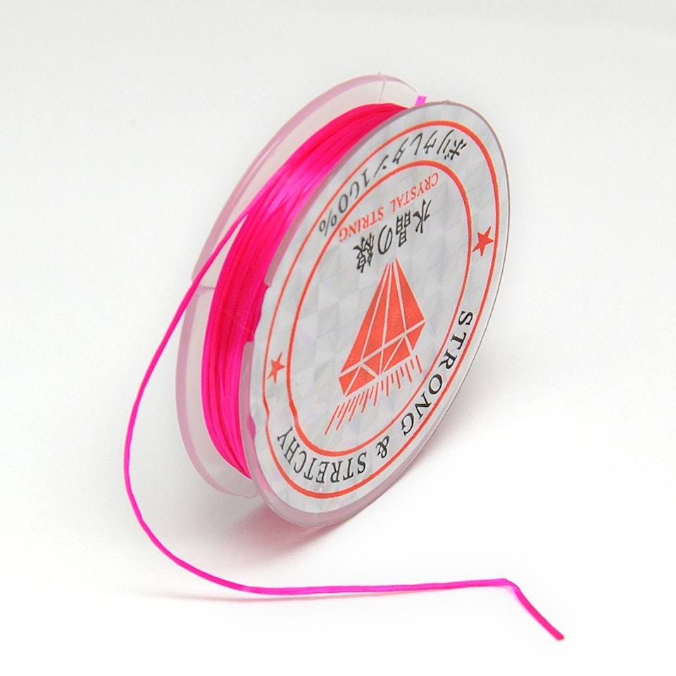 Färgad Elastisk nylontråd på rulle 0,6mm Djup rosa