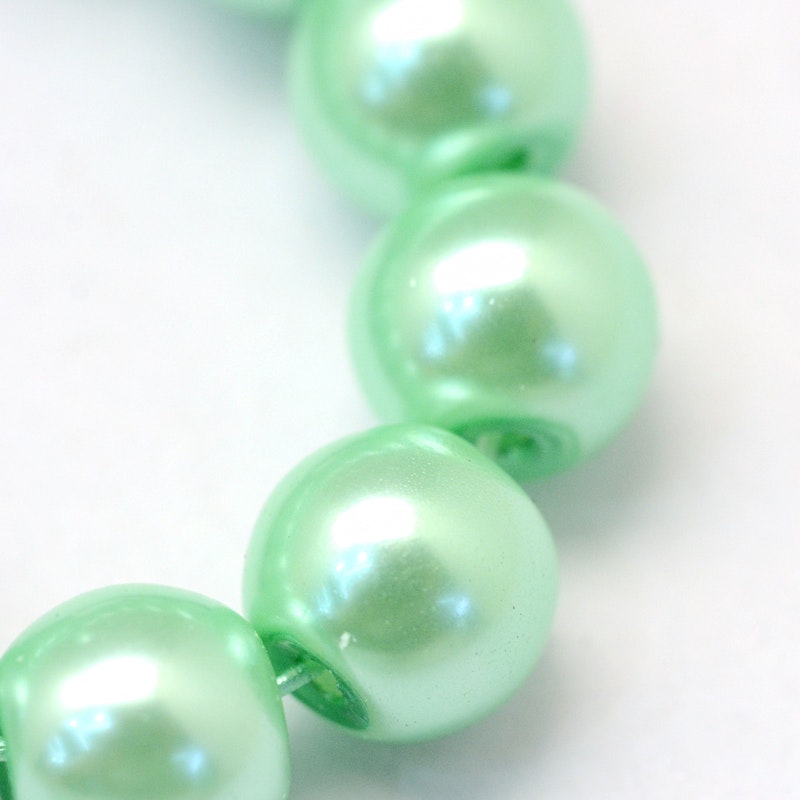 Vaxade glaspärlor - 6-7 mm - ljus grön - 25-p