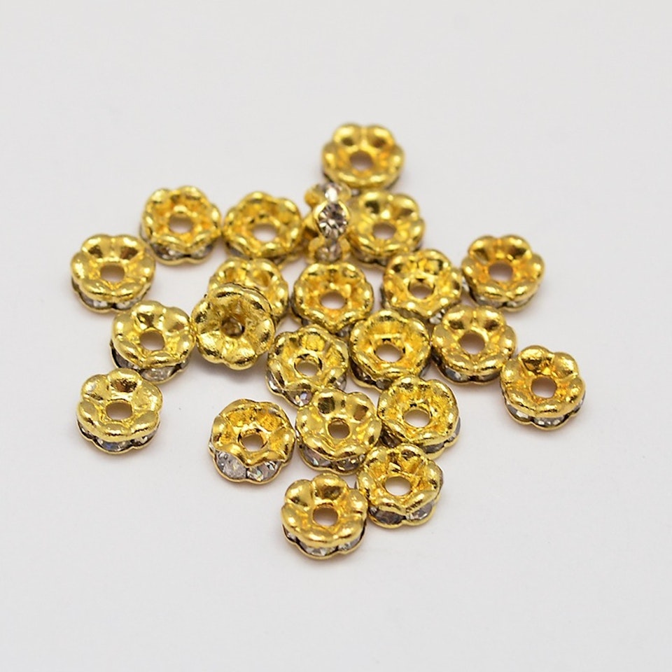 Blomster strass rondeller  - 4mm guld/klar - 10-p